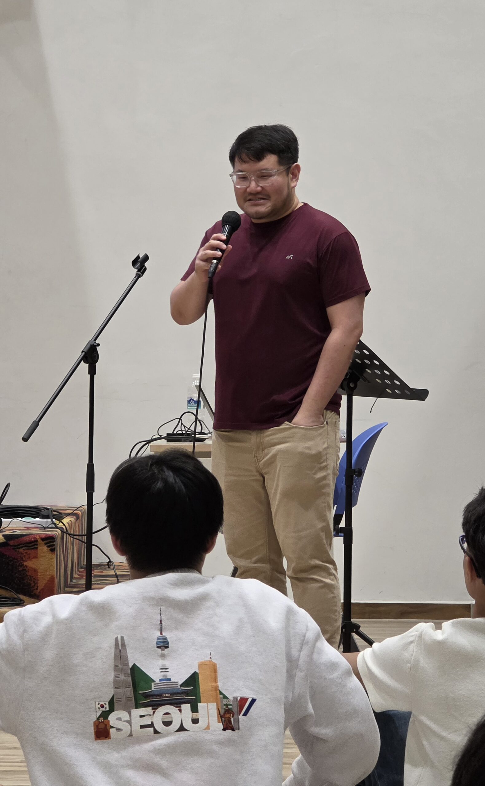 Jonathan Seet presenting to a youth audience